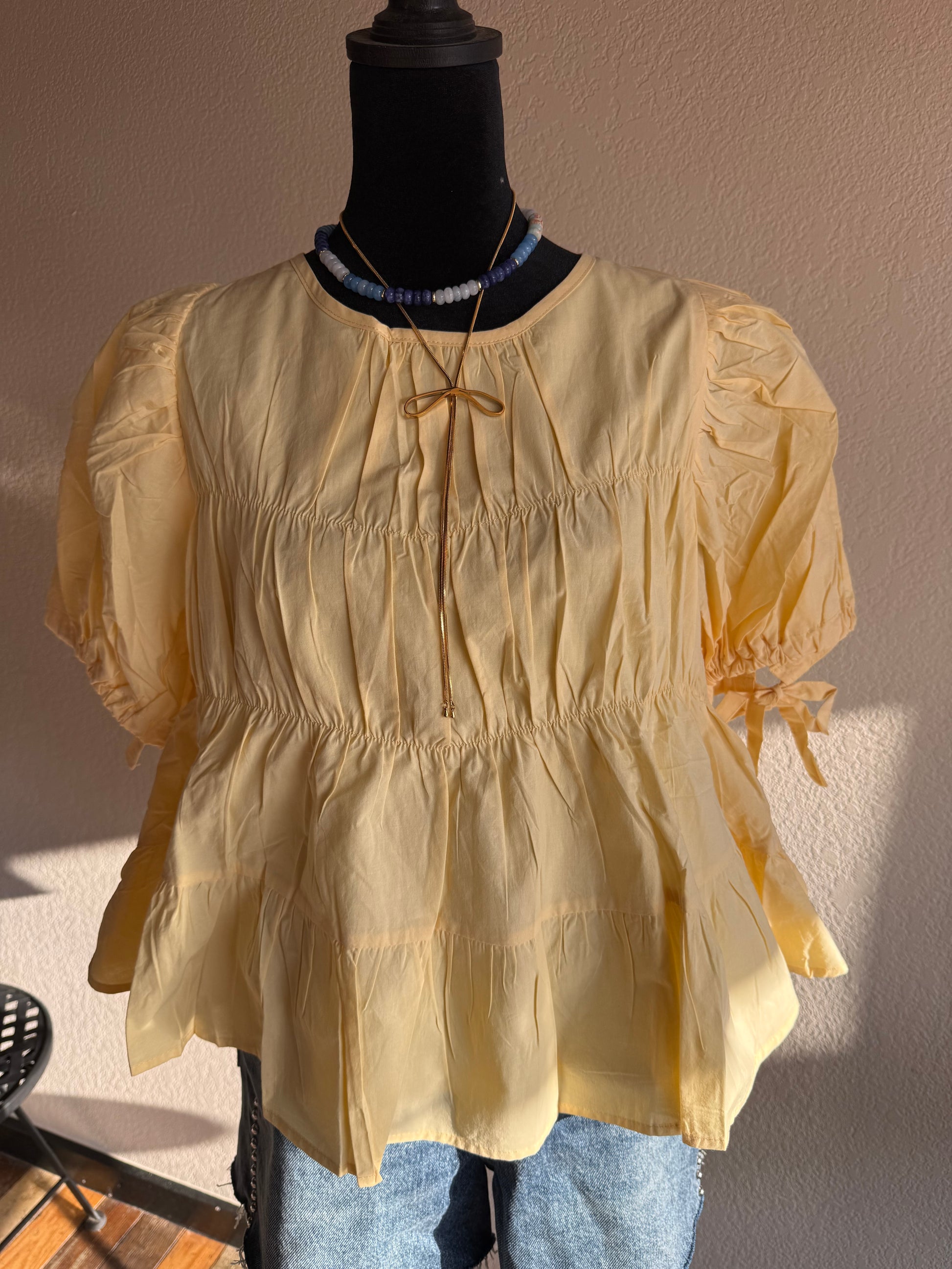 yellow and black top