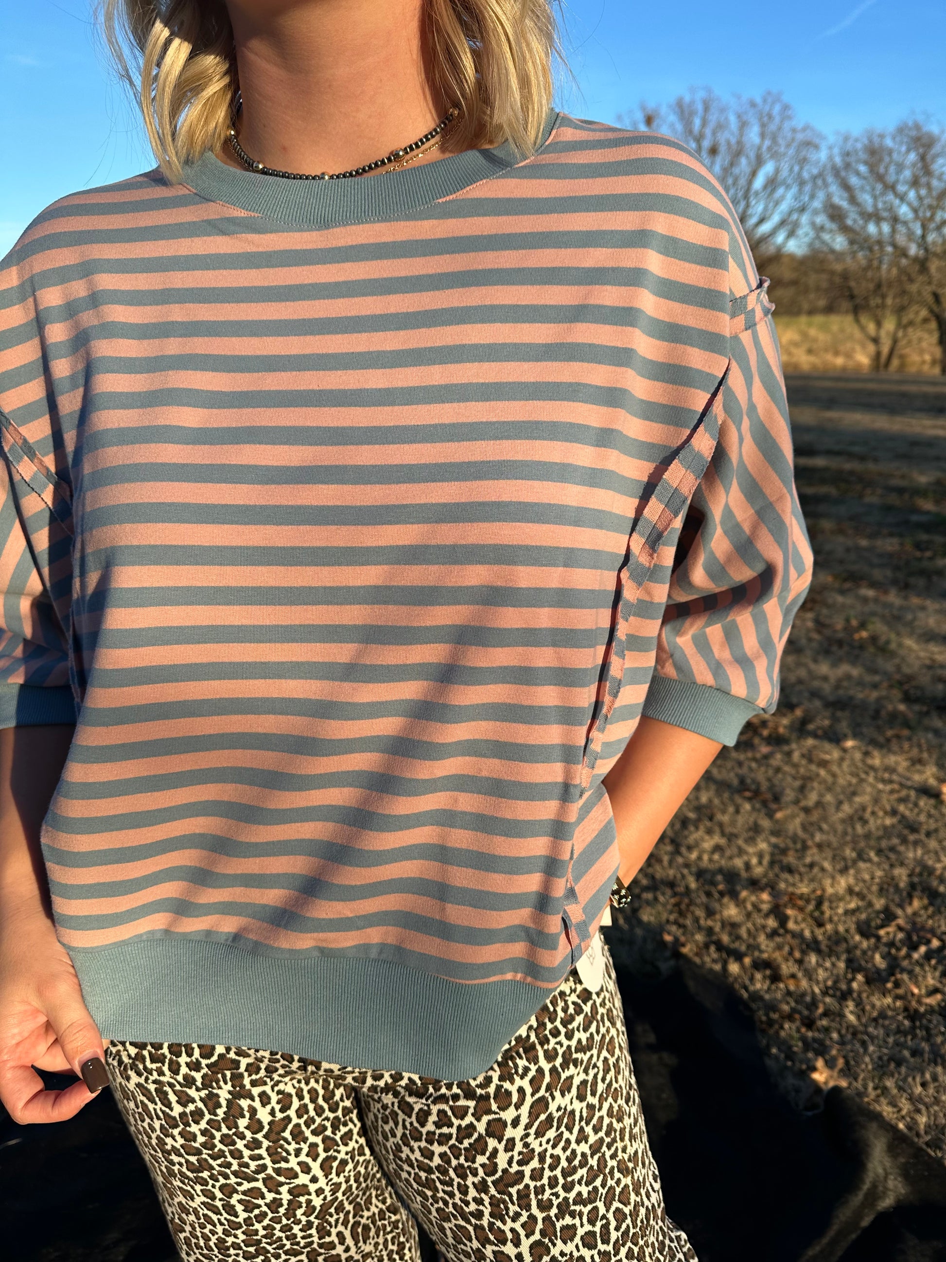 blue and pink sweater